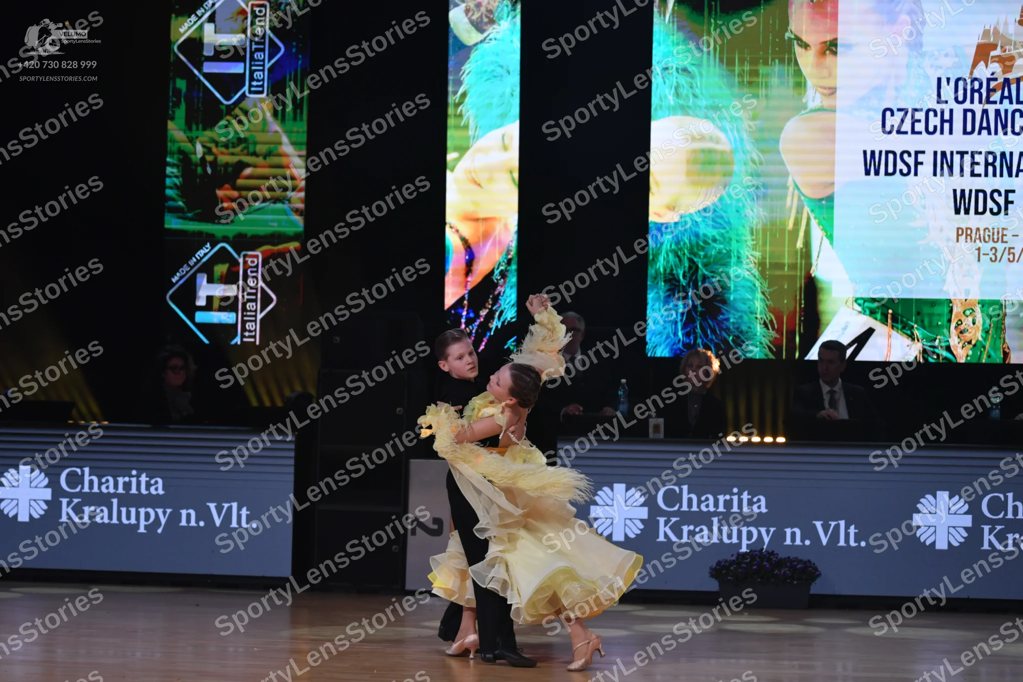 Dancesport competitor: Male dancer: black suit