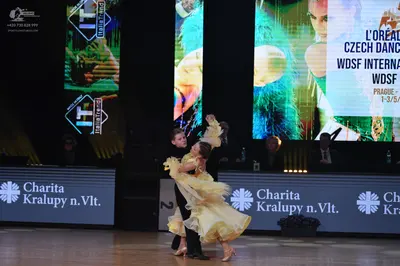 Dancesport competitor: Male dancer: black suit