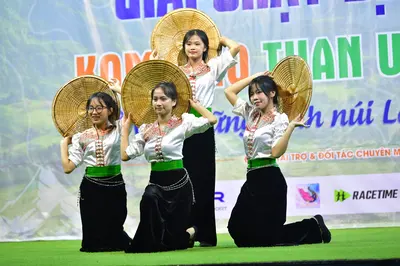 Marathon runner: All individuals: white embroidered shirts, black pants, and green sashes