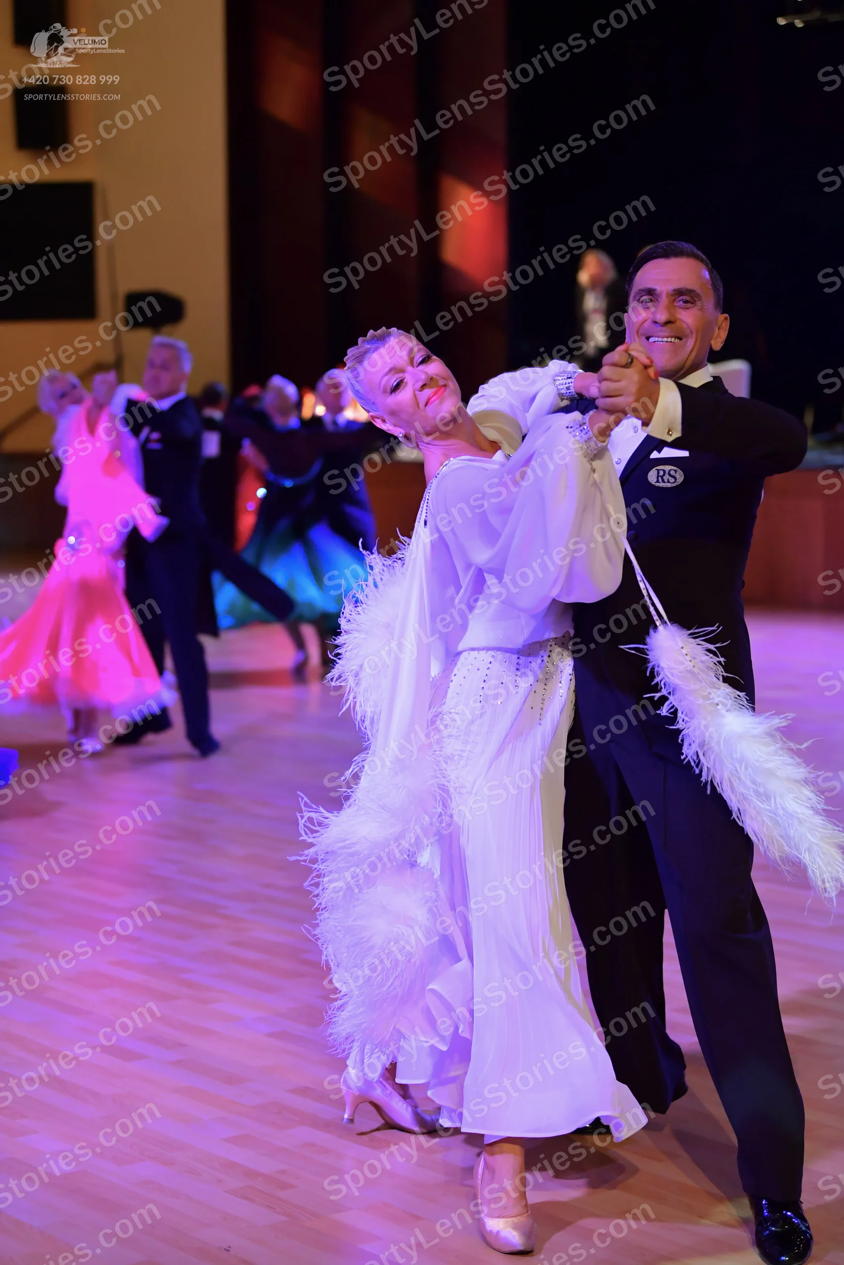 Dancesport competitor: ** Black tailsuit