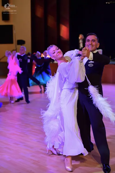 Dancesport competitor: ** Black tailsuit