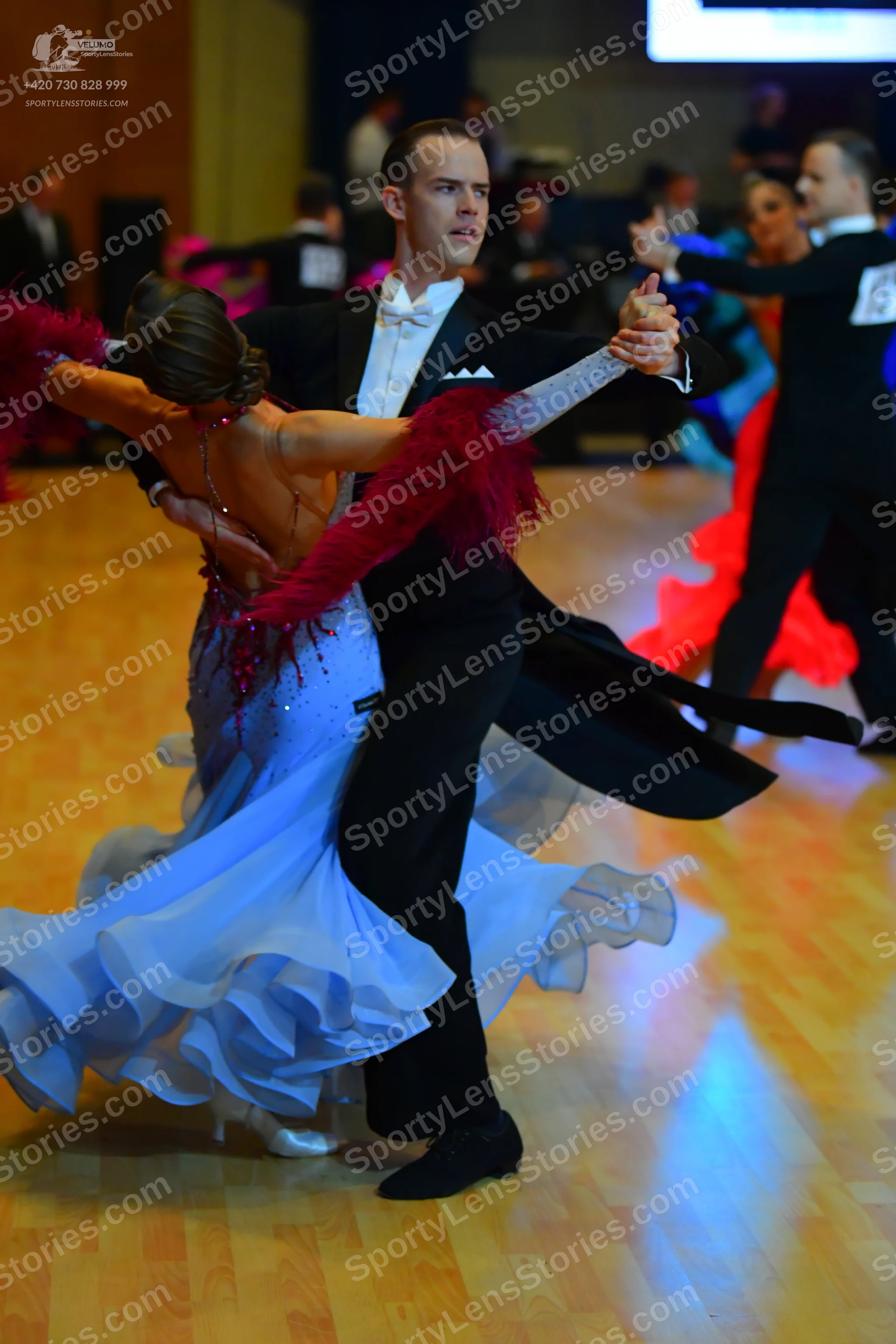 Dancesport competitor: Main male dancer: black tailcoat, white shirt, and white bowtie