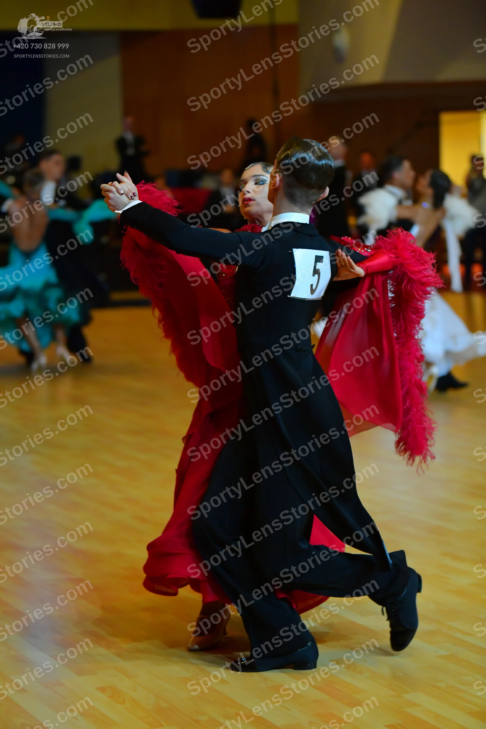 Dancesport competitor: Male dancer: black suit
