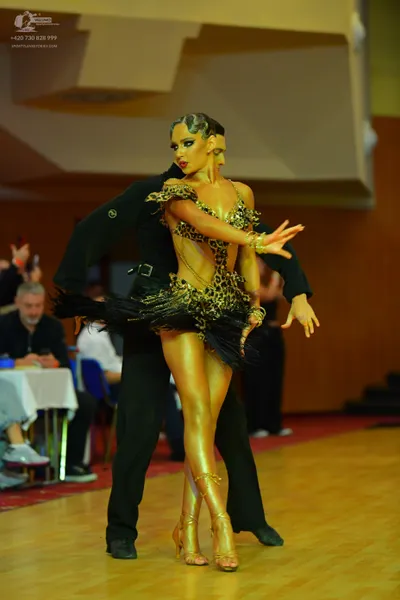 Dancesport competitor: Male dancer: black suit