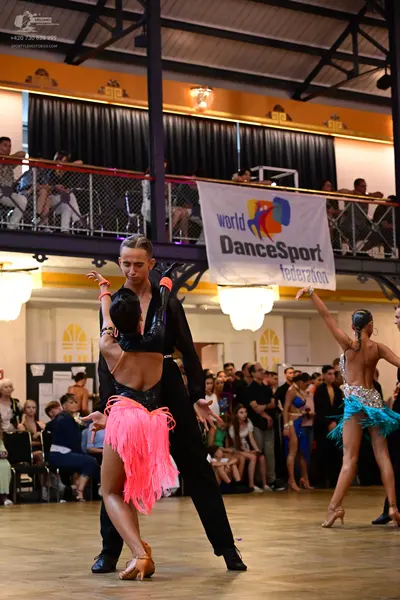 Dancesport competitor: Male dancer: black suit