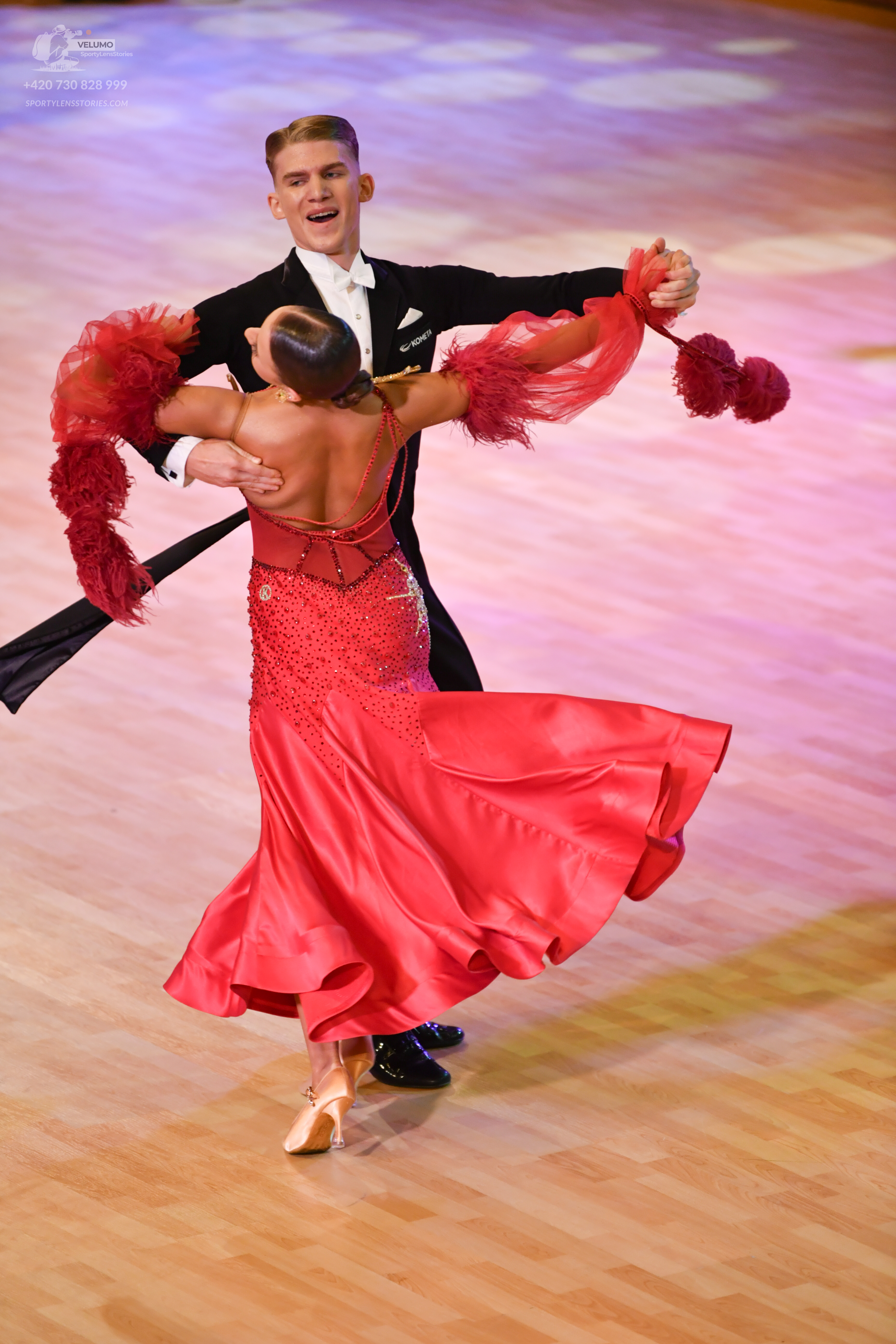 Dancesport competitor: Male**
*   **Color:** Black
*   **Fabric:** Sequin
*   **Style:** Tail suit
*   