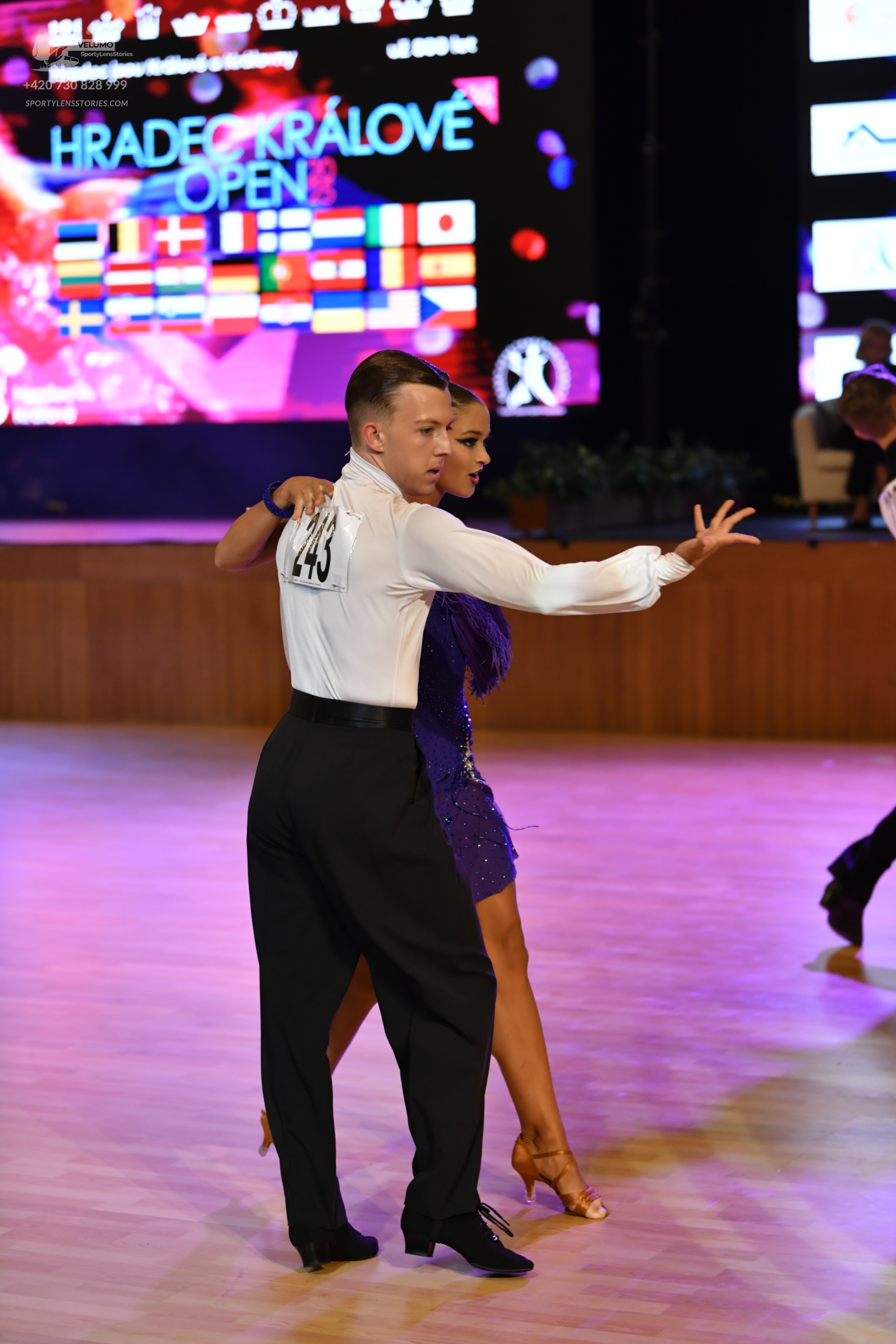 Dancesport competitor #1420: ** Black suit
*   **Fabric:** Black sequins 
*   **Style:** Tailored suit with s