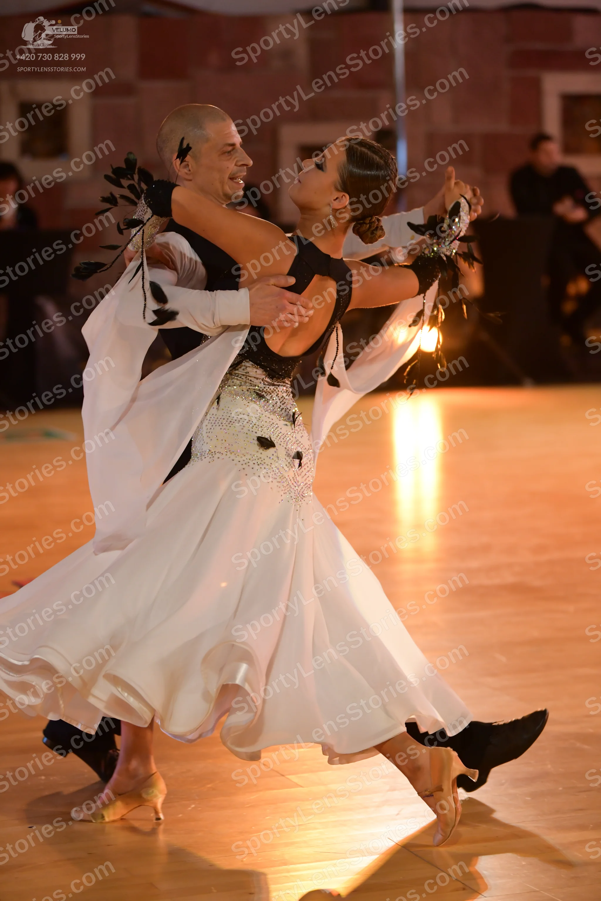 Dancesport competitor: Male dancer: black top