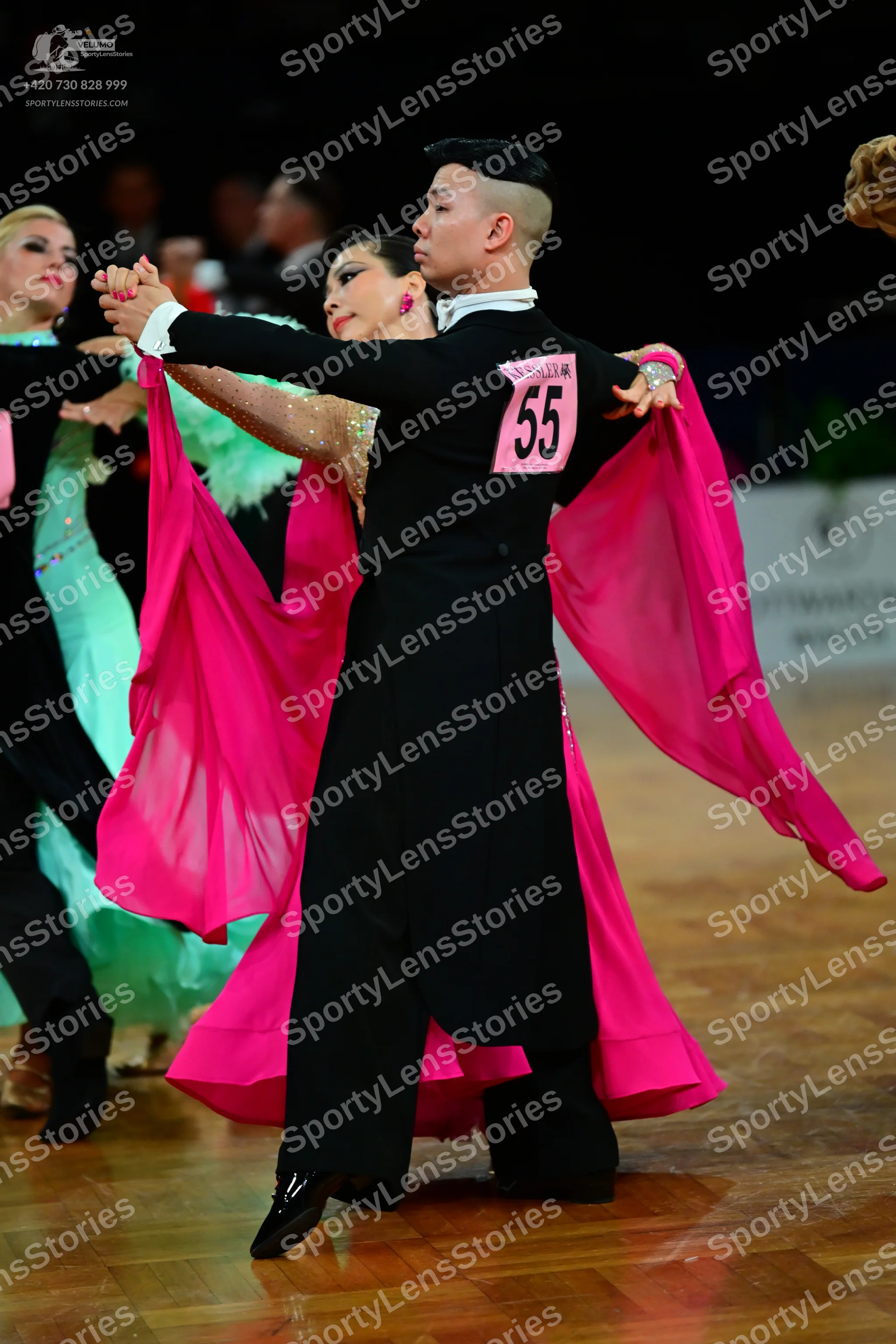 Dancesport competitor #55: Male dancer: black long-sleeved shirt and black trousers