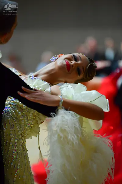 Dancesport competitor: Male dancer: black suit