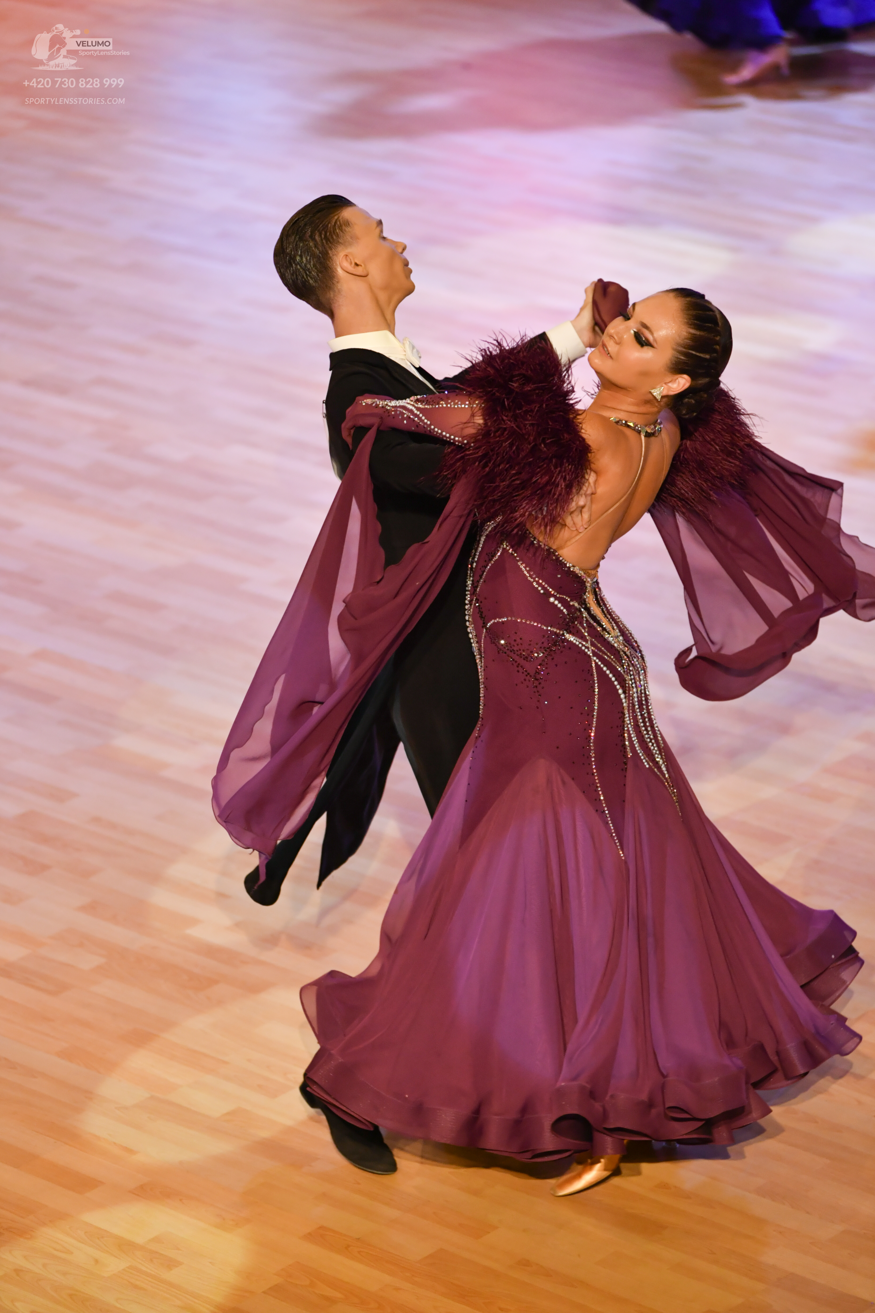 Dancesport competitor #2: Male:** Black tailsuit with silver sequin detailing on the lapels and sleeves
