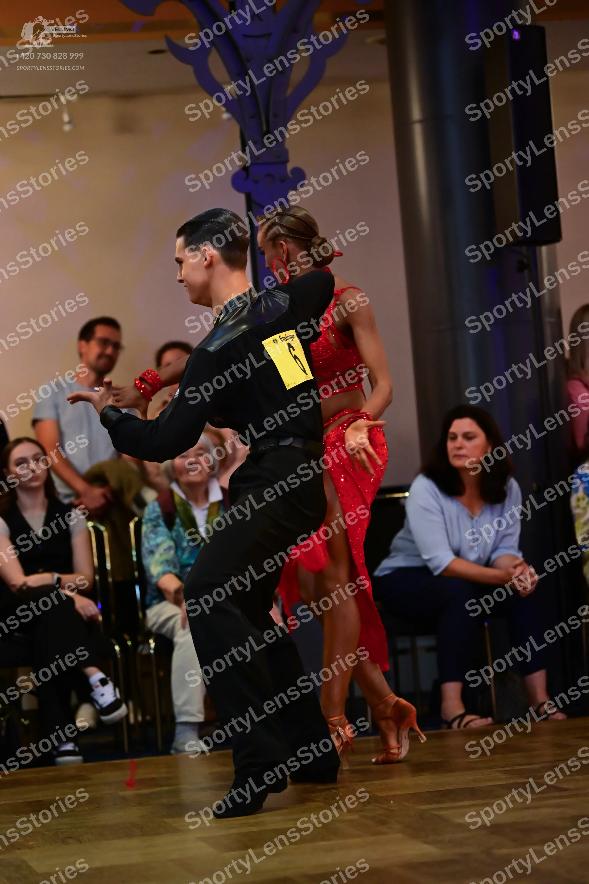 Dancesport competitor #73: Male dancer: black long-sleeved shirt and black trousers