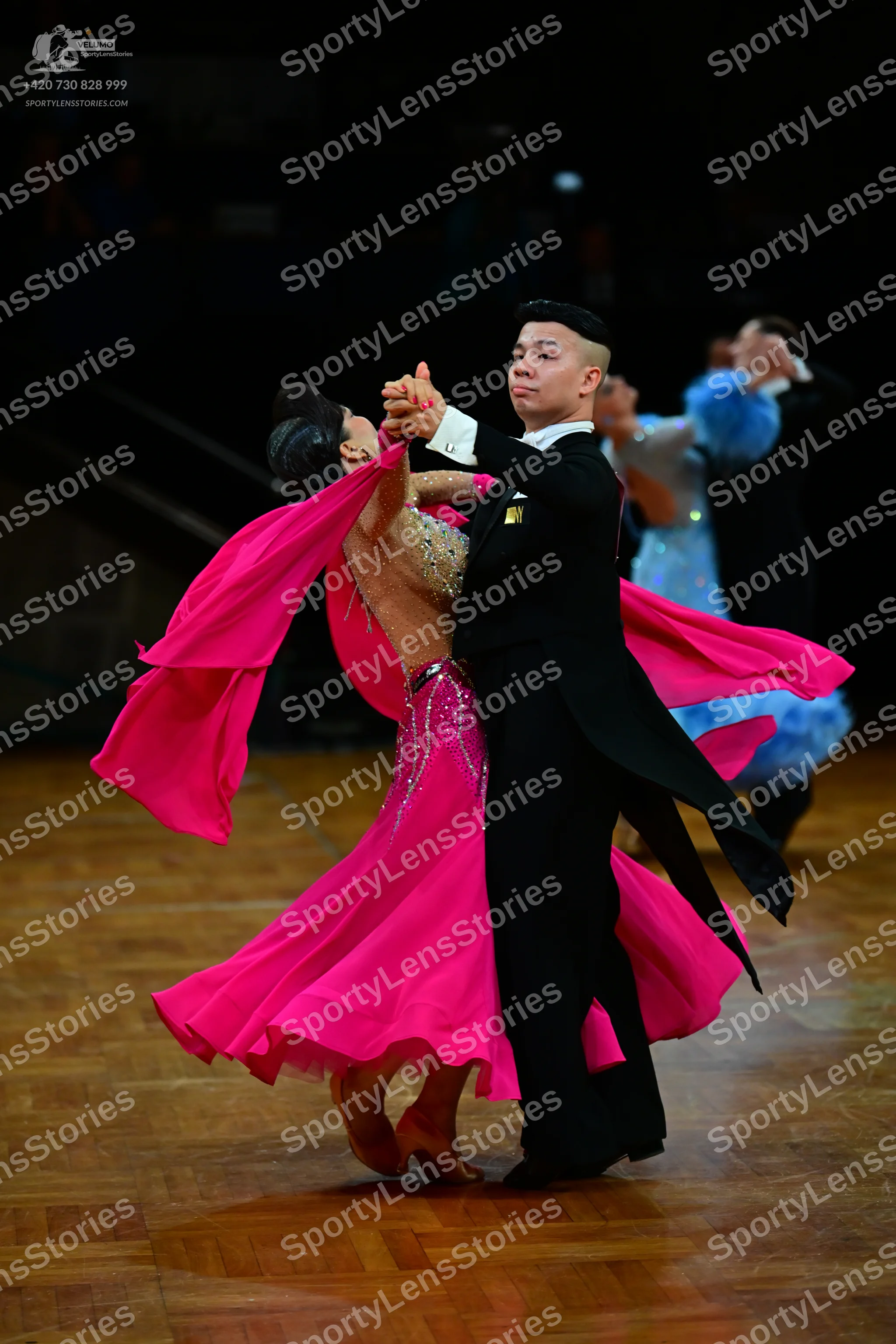 Dancesport competitor: Male dancer: black ballroom tailcoat, white shirt, and black trousers