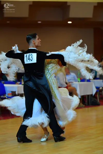 Dancesport competitor #143: Male dancer: black long-sleeved top and black trousers
