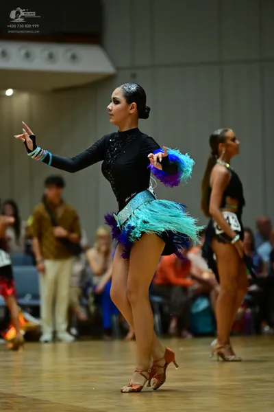 Dancesport competitor: ** Black Latin dress