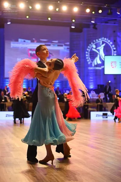 Dancesport competitor: Male dancer: black suit