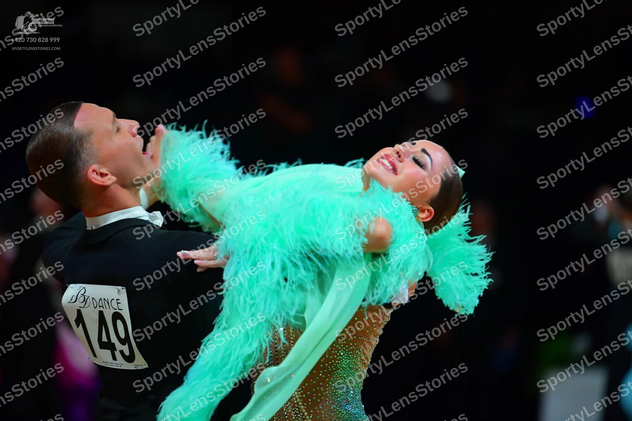 Dancesport competitor #149: Male dancer: black long-sleeved top with a white collar