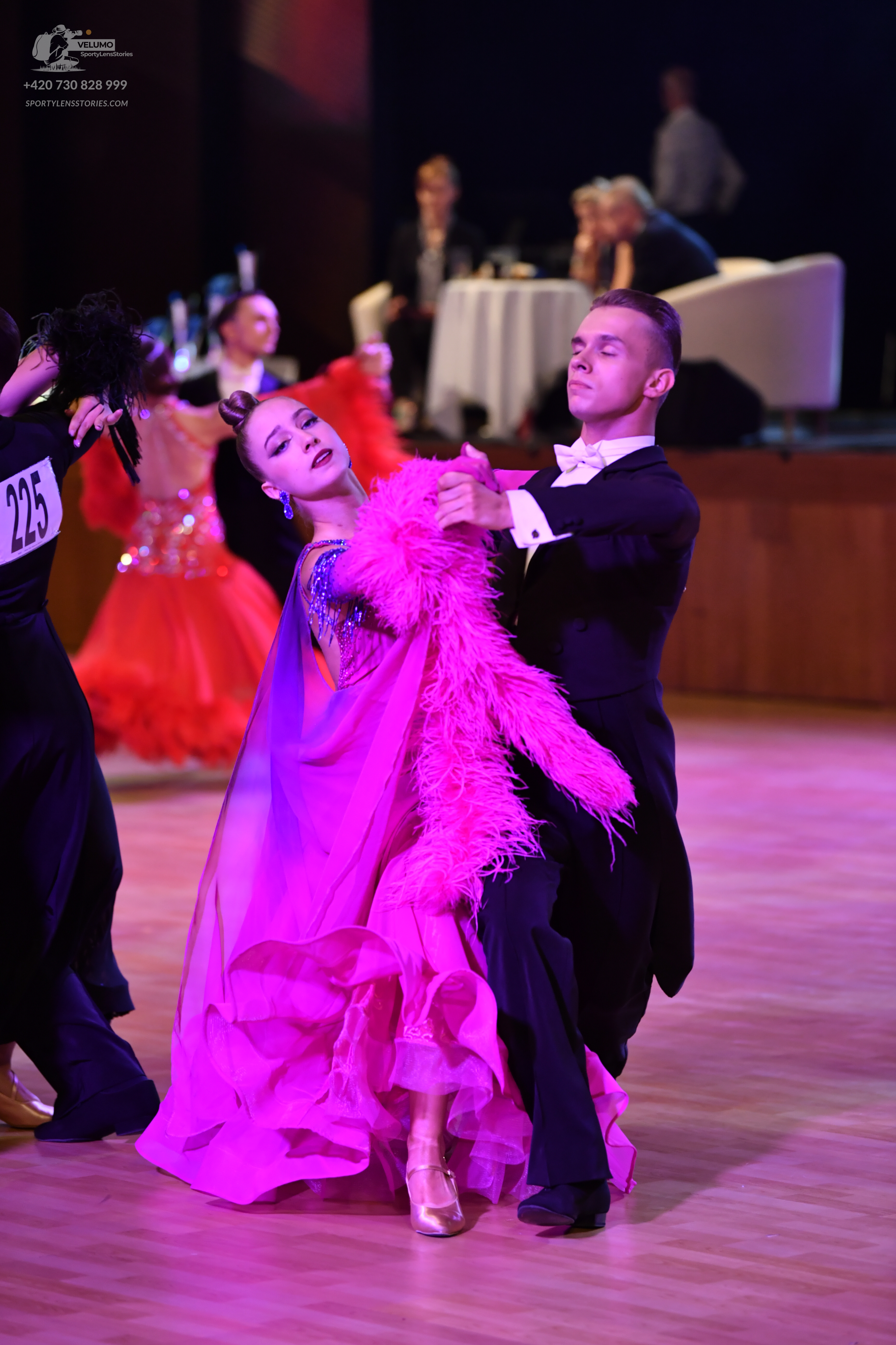 Dancesport competitor #225: Male dancer: black suit with a white shirt and white bow tie