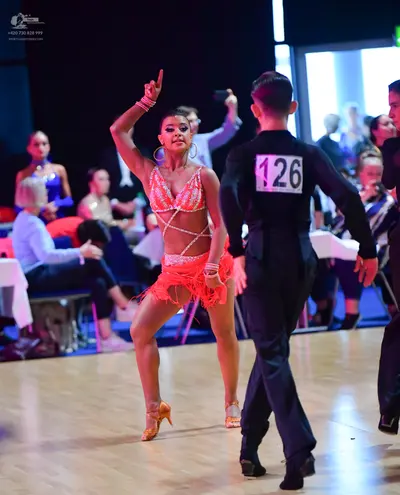 Dancesport competitor #126: Male dancer: black long-sleeved shirt and black trousers