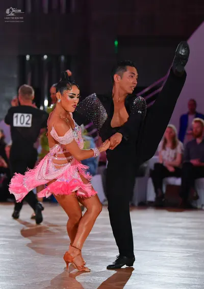 Dancesport competitor #102: Female dancer: pink latin dress with sequins and fringe