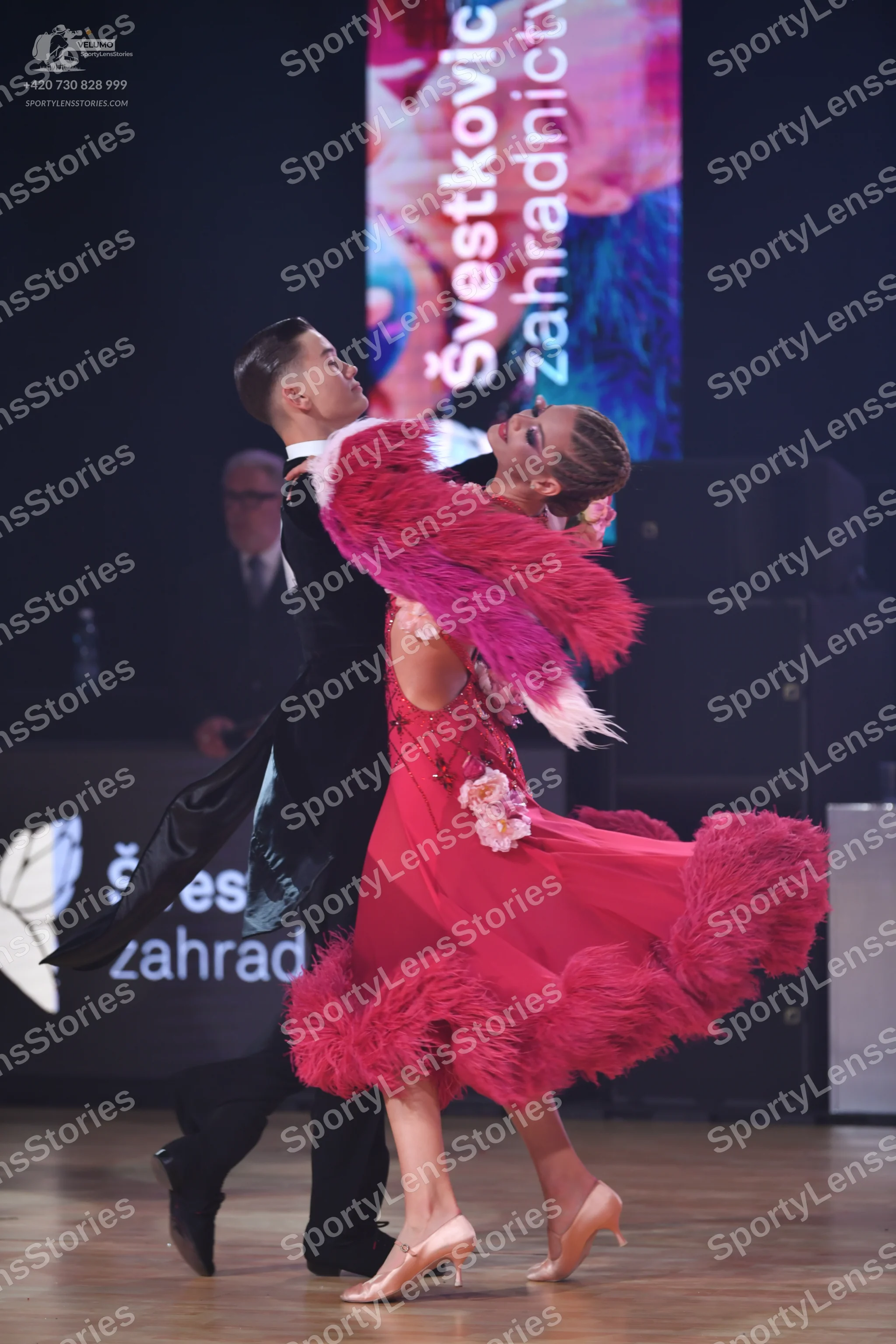 Dancesport competitor: Male dancer: black tailcoat, white shirt, and black trousers