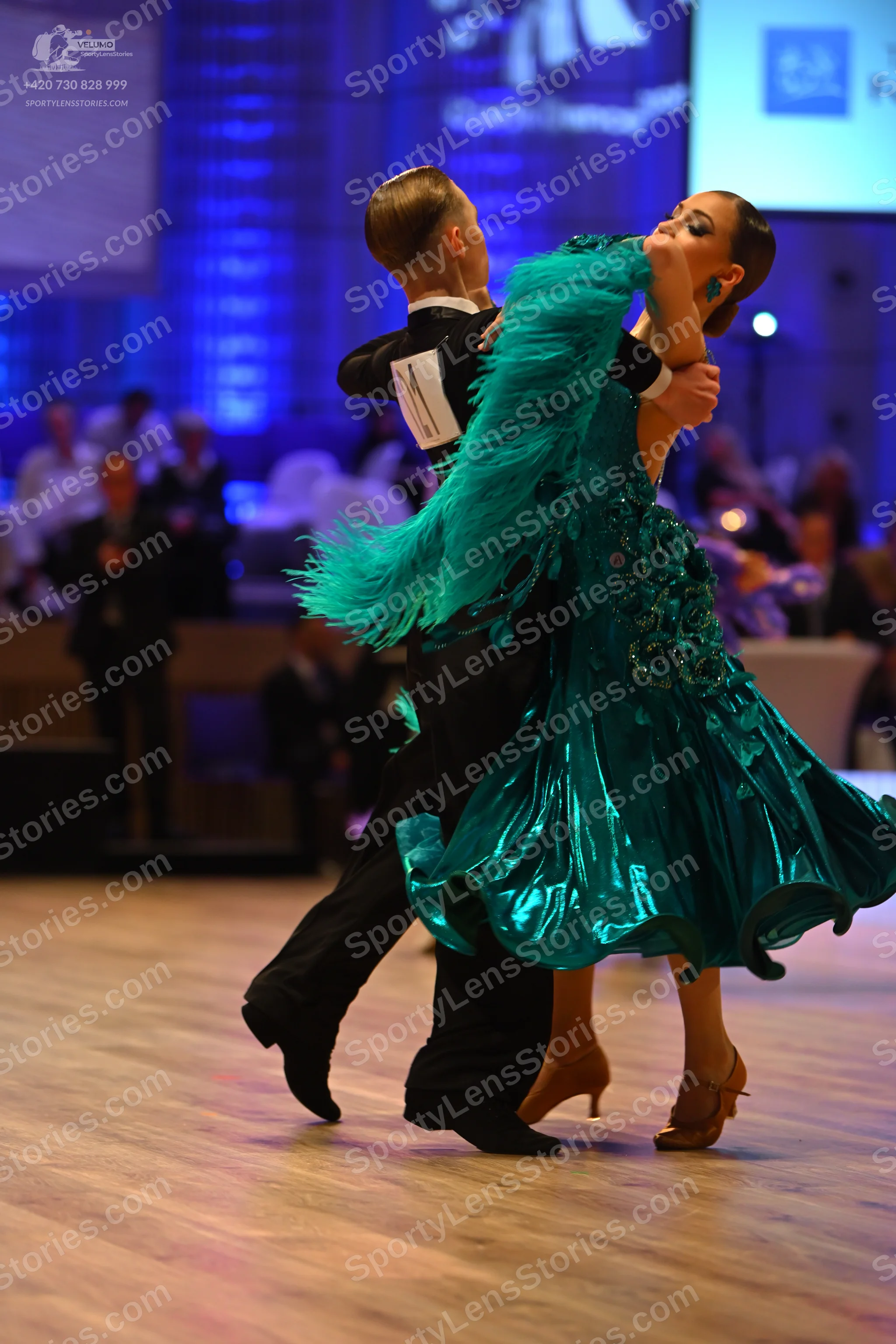 Dancesport competitor: Male dancer: black suit