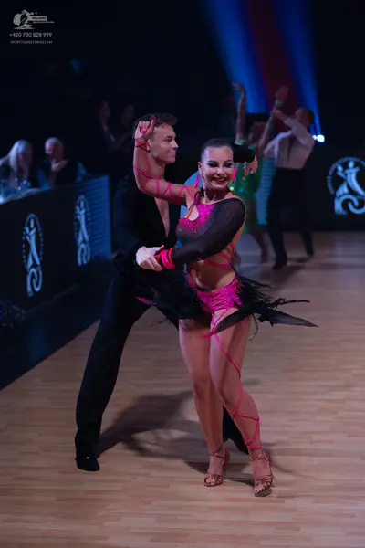 Dancesport competitor: Male dancer: black dance suit