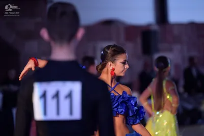 Dancesport competitor #111: Male dancer: black long-sleeved top