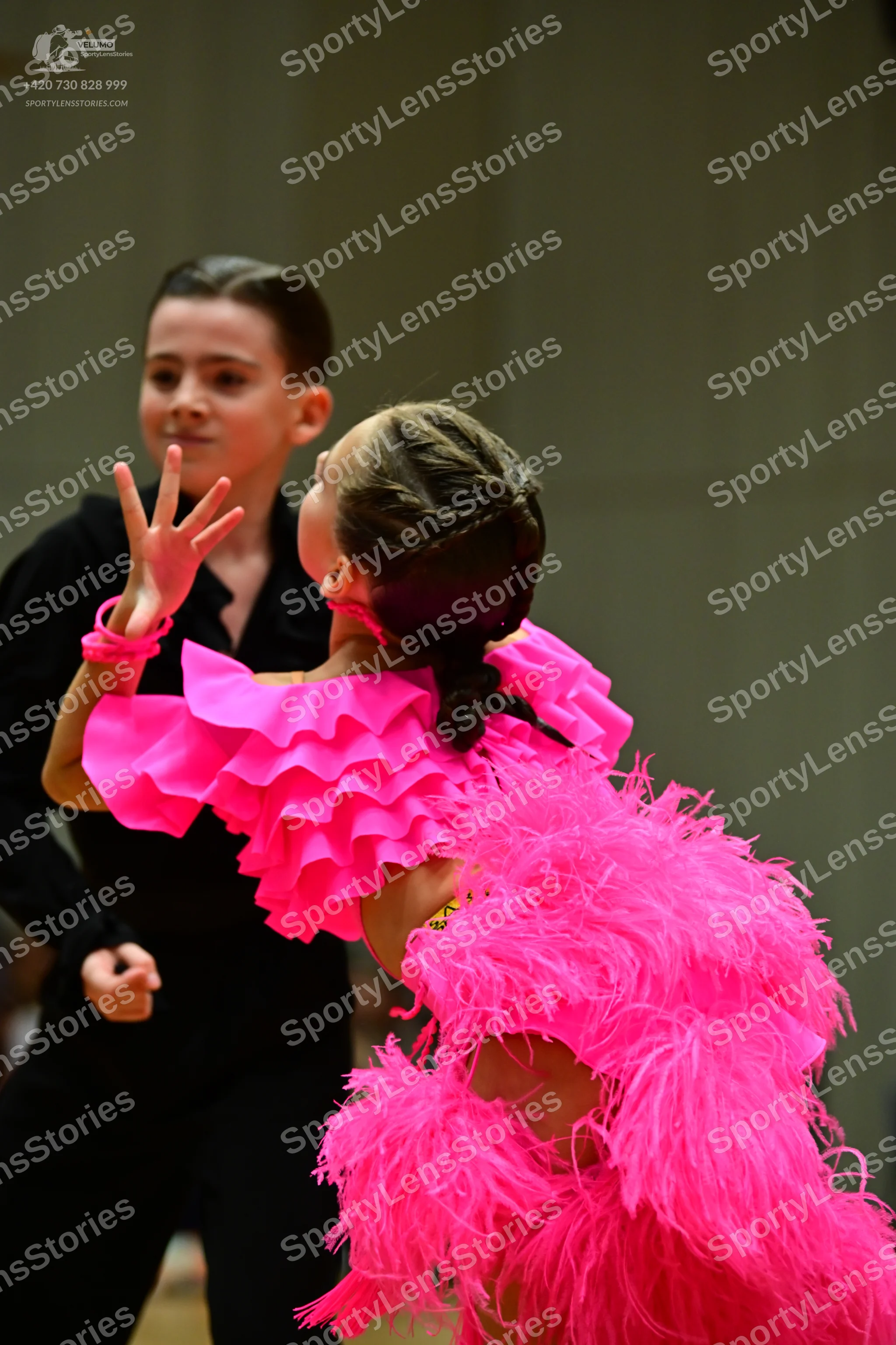 Dancesport competitor: Male dancer: black long-sleeved shirt and black trousers