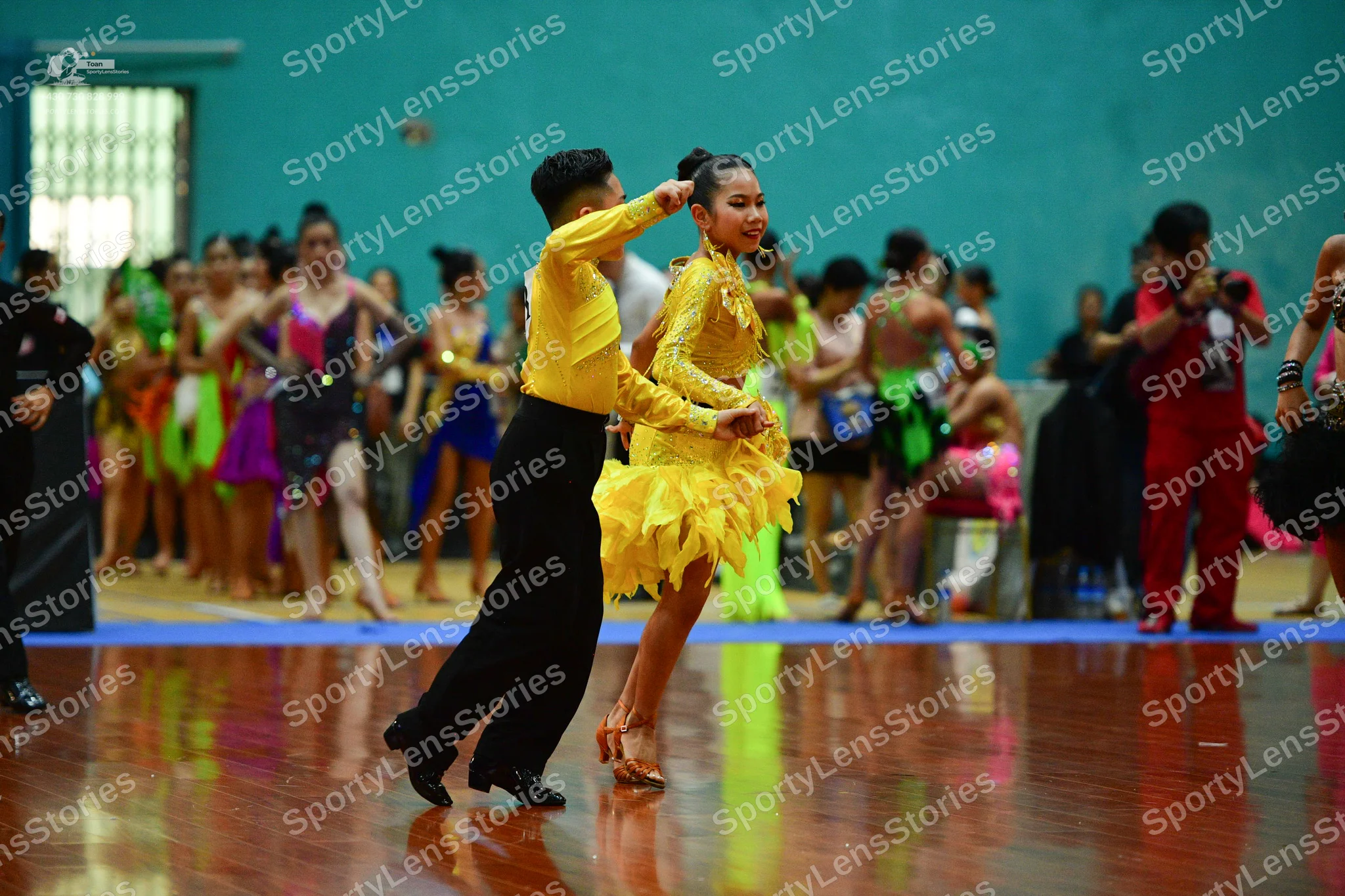 Dancesport competitor: ** Black tail suit