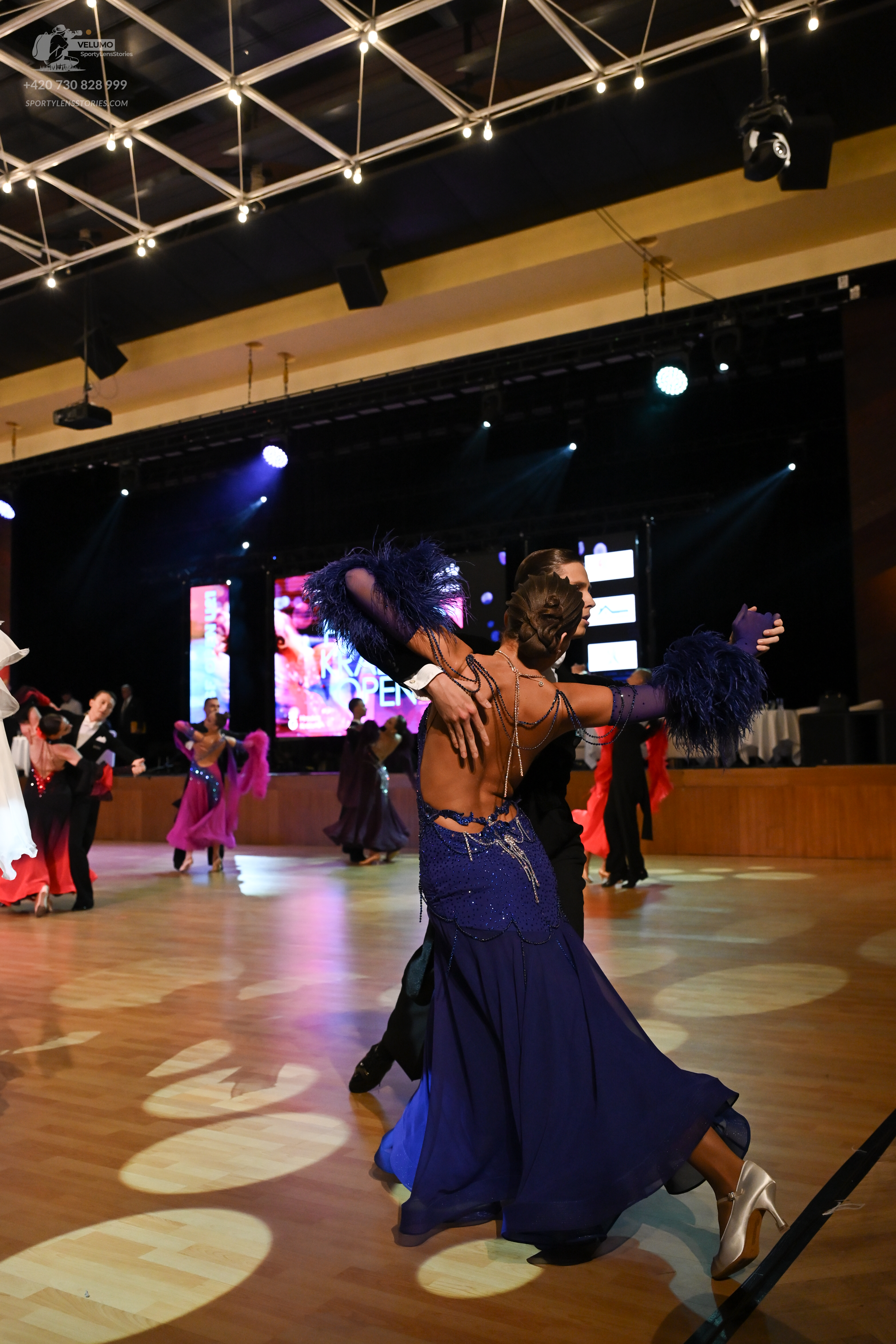 Dancesport competitor: ** Black ballroom suit