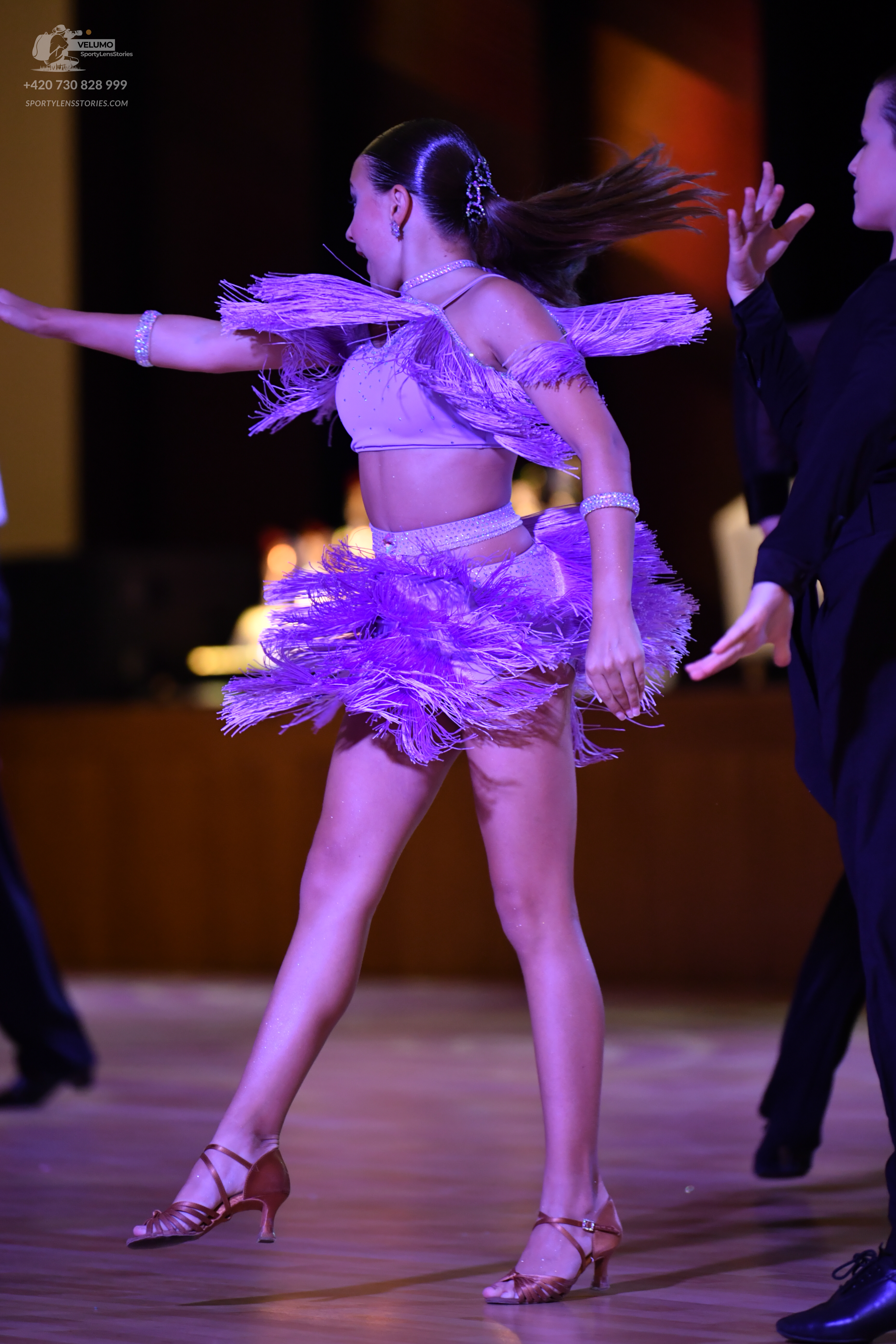 Dancesport competitor: ** Latin Dress
*   **Color:** Fuchsia/Magenta
*   **Fabric:** Satin (likely with