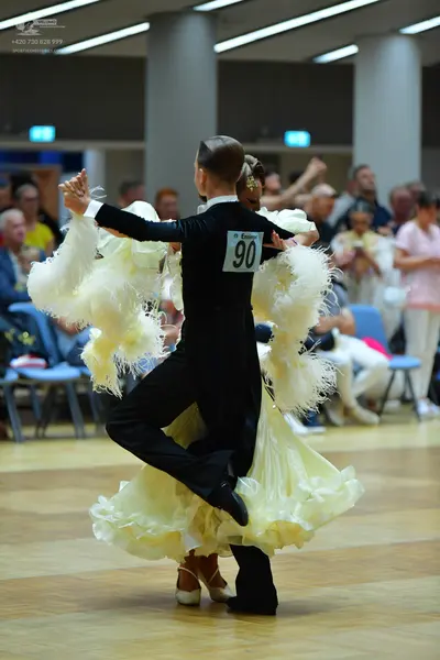 Dancesport competitor #90: Male dancer: black suit