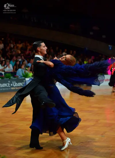 Dancesport competitor: Male dancer: black tailcoat with a white shirt