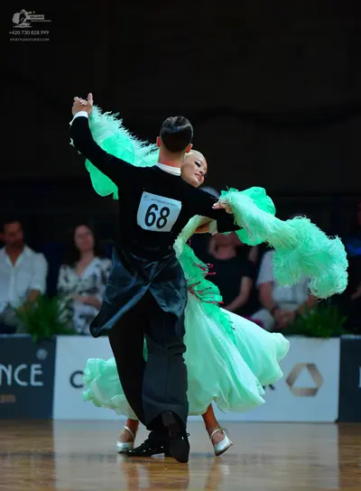 Dancesport competitor #68: Male dancer: black long-sleeved top and black trousers