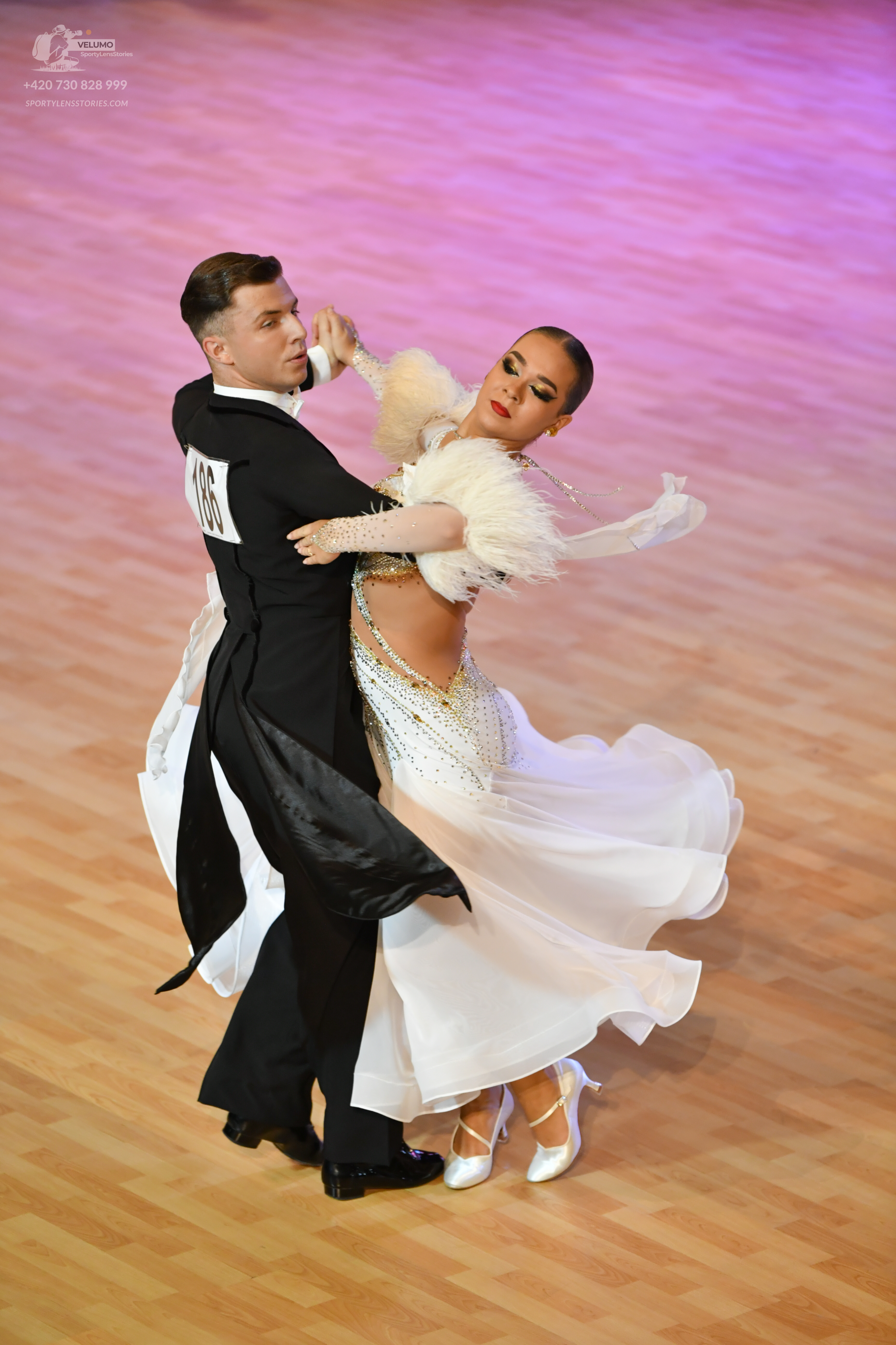 Dancesport competitor: ** Male: Black tail suit with black trousers and a black jacket