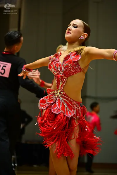 Dancesport competitor #25: Male dancer: black long-sleeved shirt and black trousers