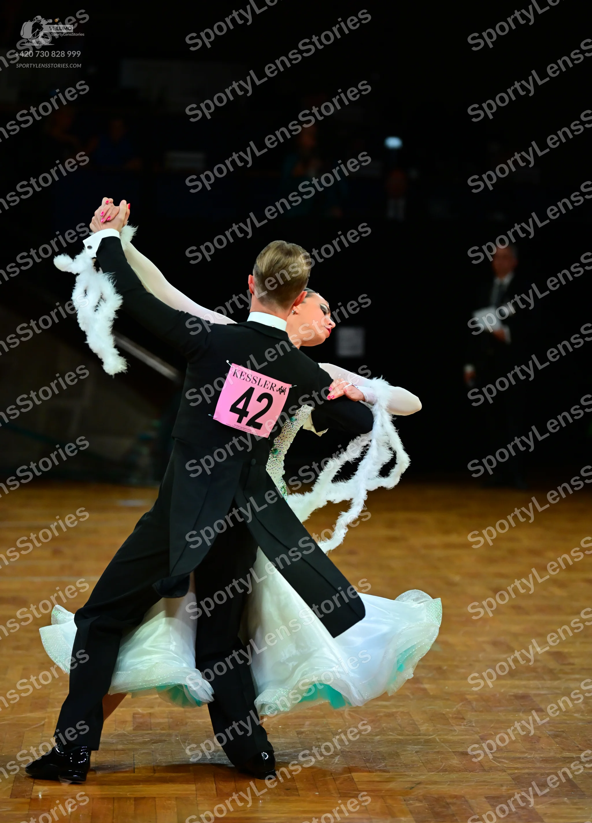 Dancesport competitor #42: Male dancer: black ballroom tailcoat and trousers