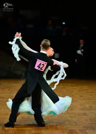 Dancesport competitor #42: Male dancer: black ballroom tailcoat and trousers