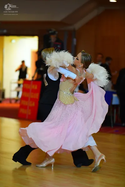 Dancesport competitor: Male dancer: black suit