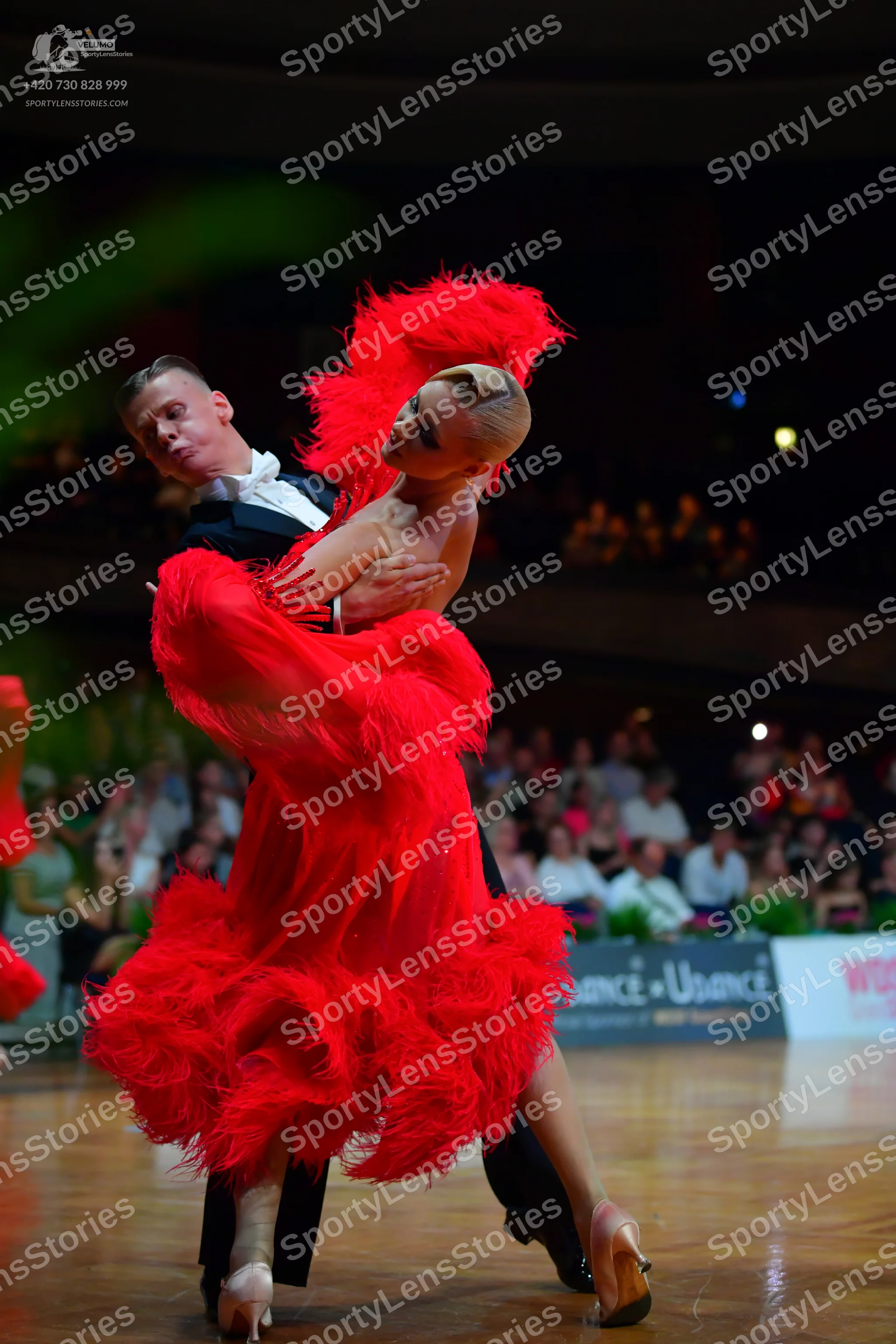 Dancesport competitor: Male dancer: black suit with a white shirt and black bowtie
