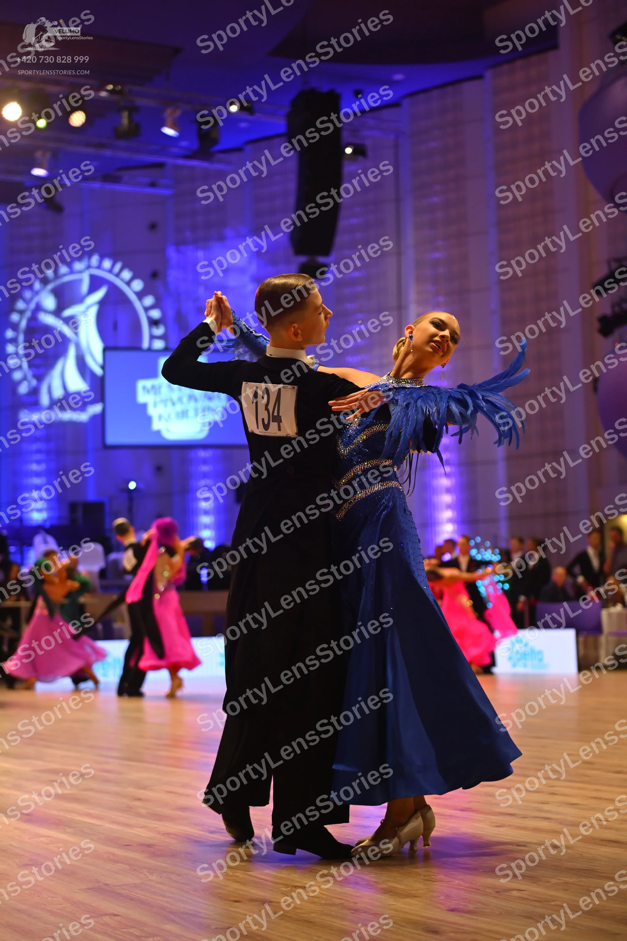 Dancesport competitor: Male dancer: black ballroom suit