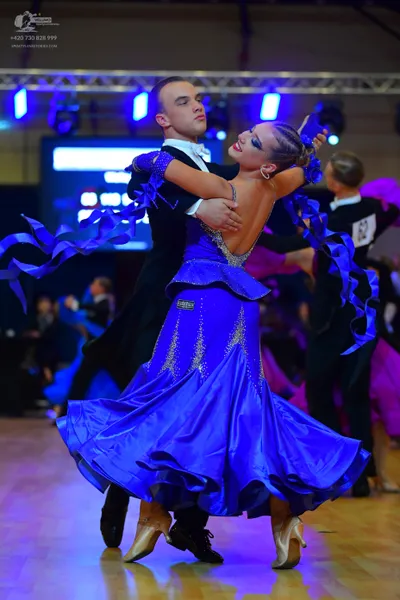 Dancesport competitor #62: Male dancer: black formal suit with a white shirt