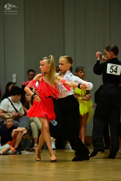 Dancesport competitor #54: Female dancer: red latin dress with fringe