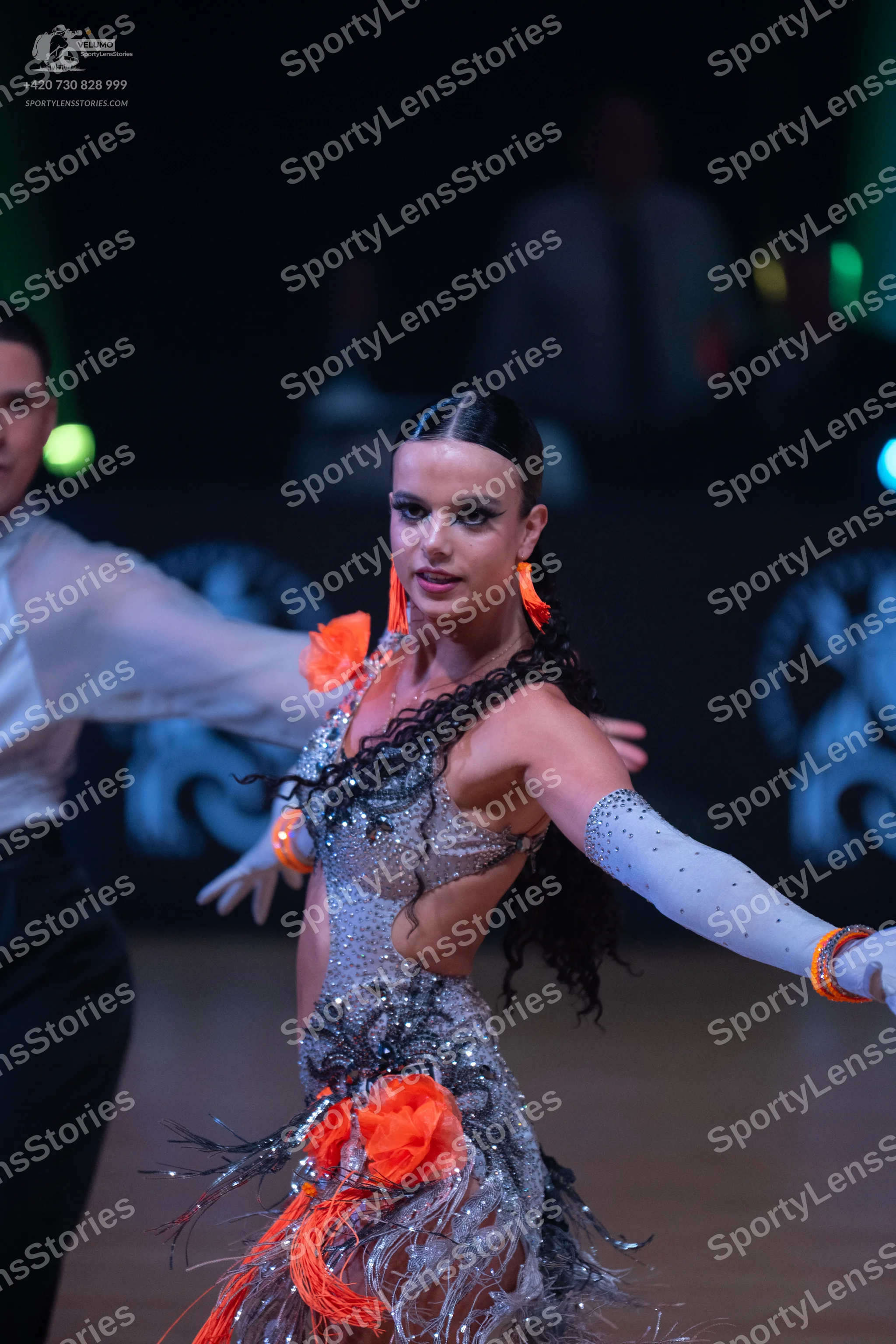 Dancesport competitor: Male dancer: white long-sleeved shirt and black trousers