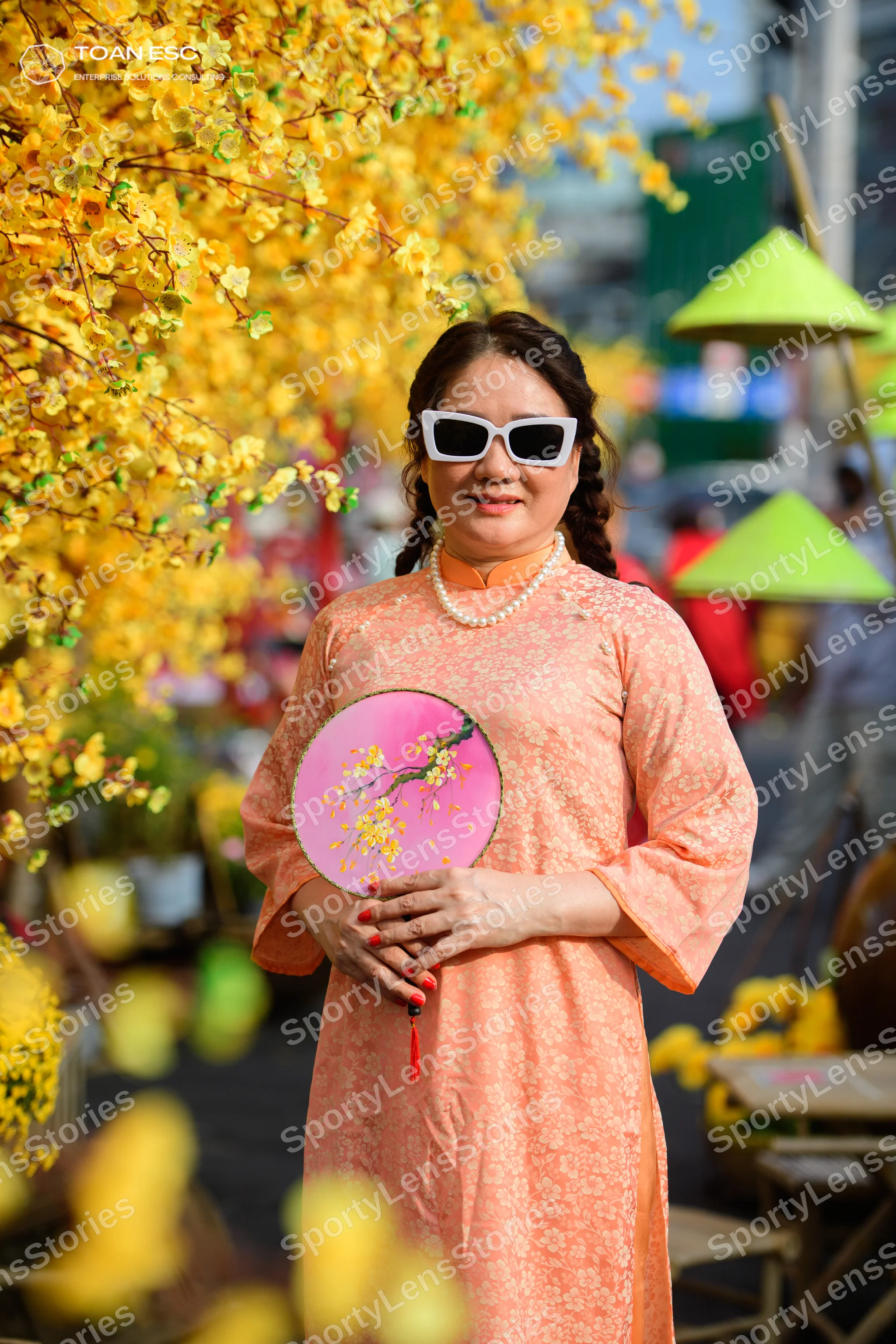 Dancesport competitor: Female dancer: peach-colored long-sleeved traditional dress with a subtle floral