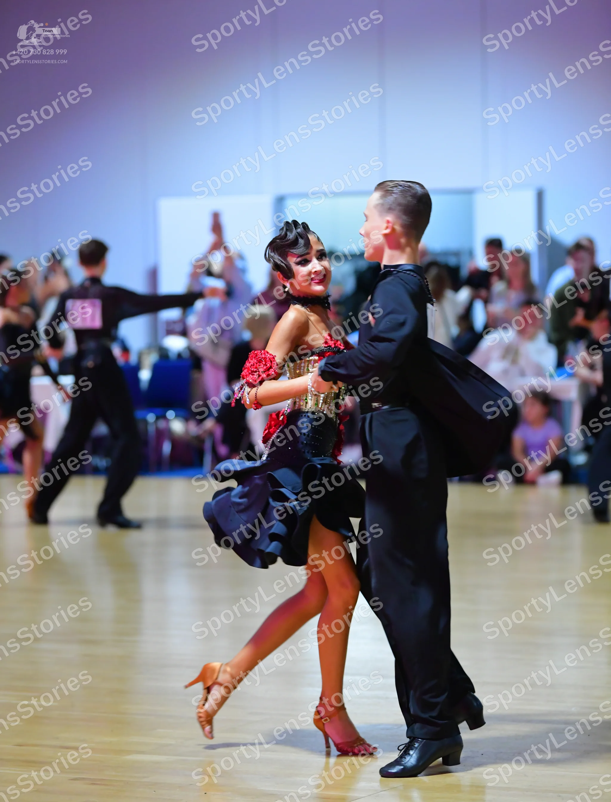 Dancesport competitor #153: Male dancer: black long-sleeved dance shirt and black trousers