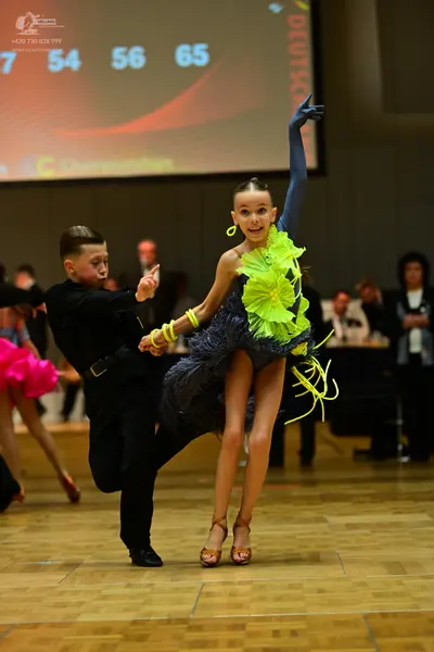 Dancesport competitor: Male dancer: black dance shirt and trousers