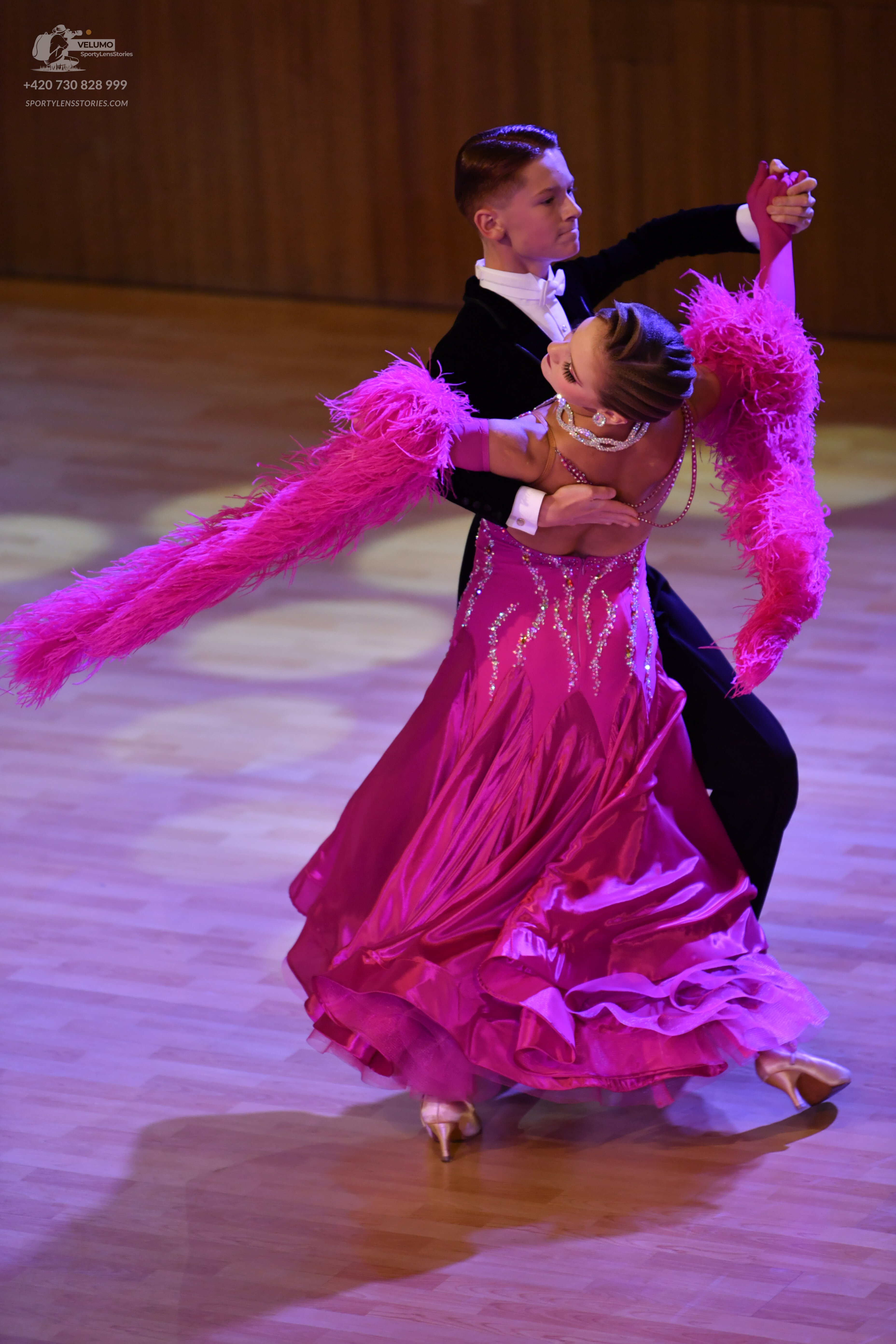 Dancesport competitor: Male** - Black tail suit with sequin lapels
