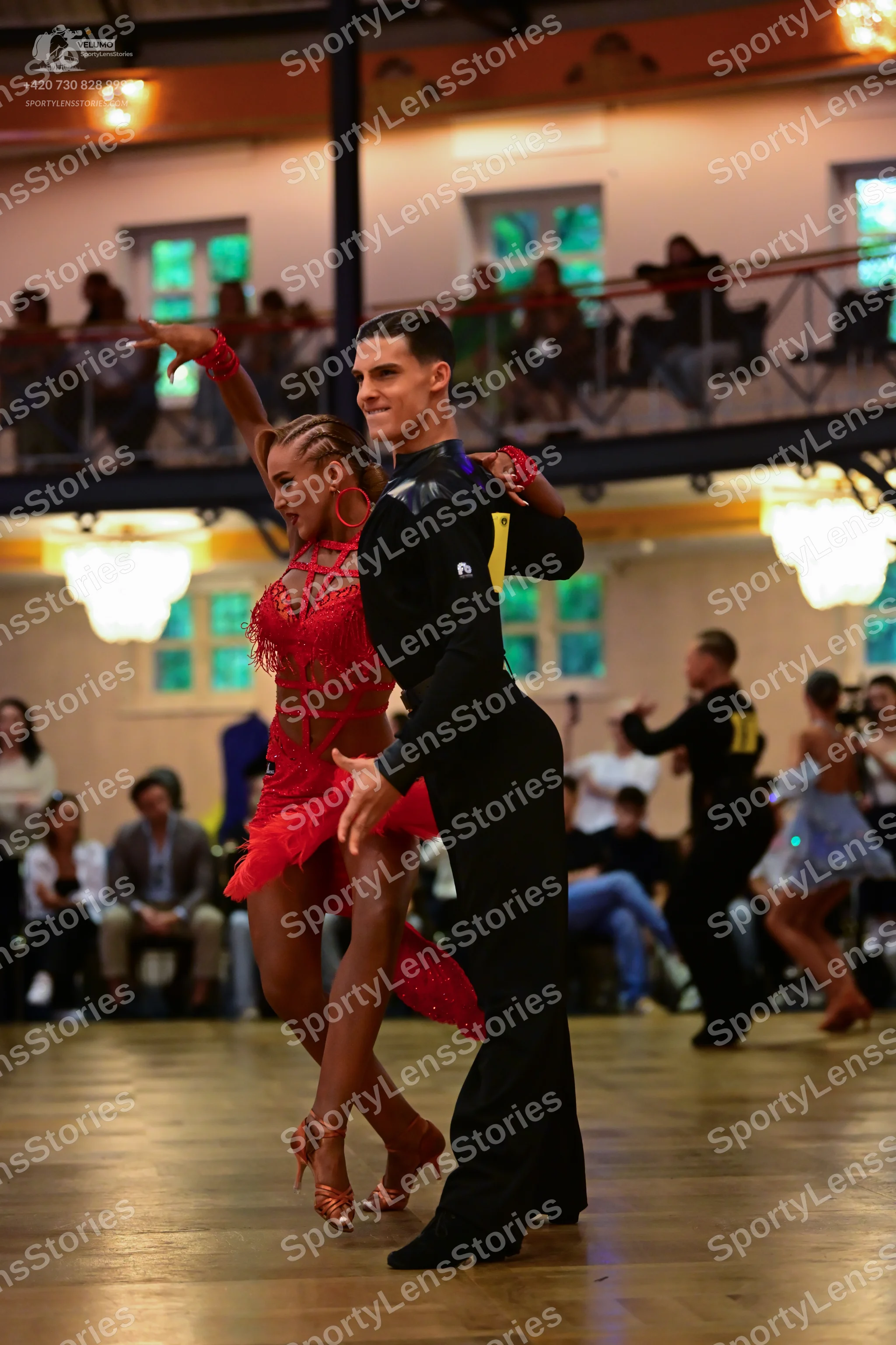 Dancesport competitor: Male dancer: black long-sleeved shirt and black trousers